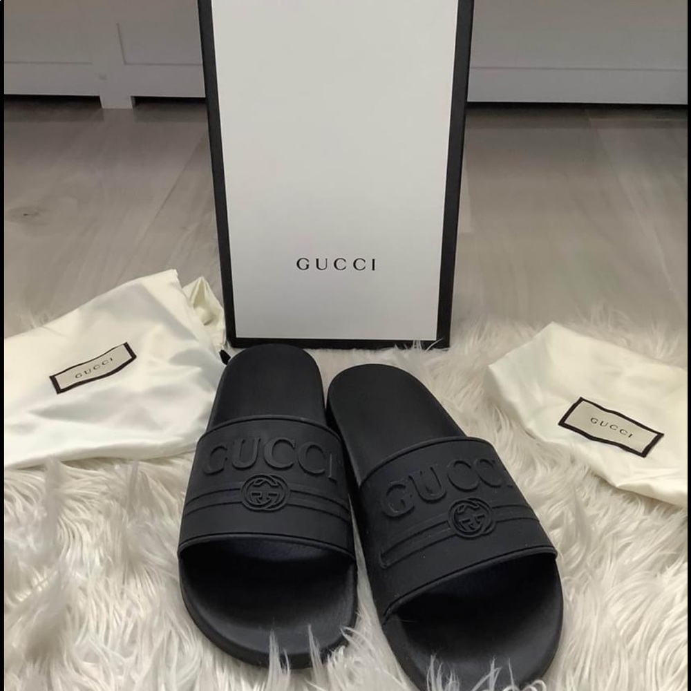 Authentic Gucci rubber slides. Retail $290